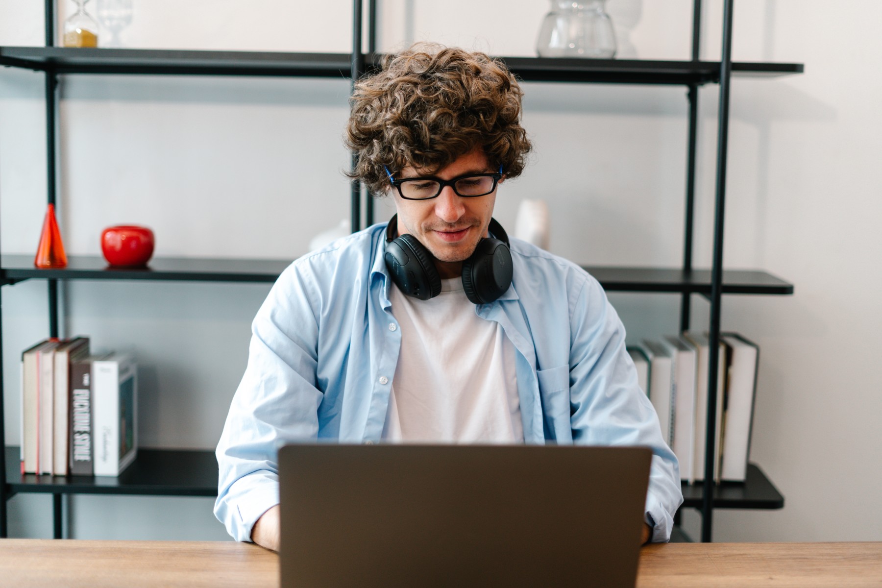 smart businessman sitting in workspace using lapt 2023 11 27 05 31 25 utc 1 1.jpg